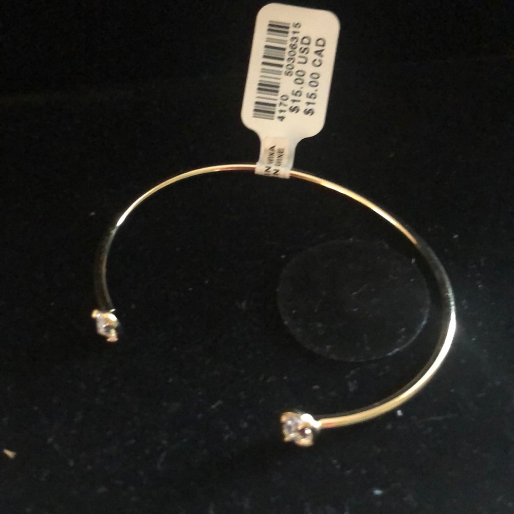 Anthropolgie gold bangle with crystal